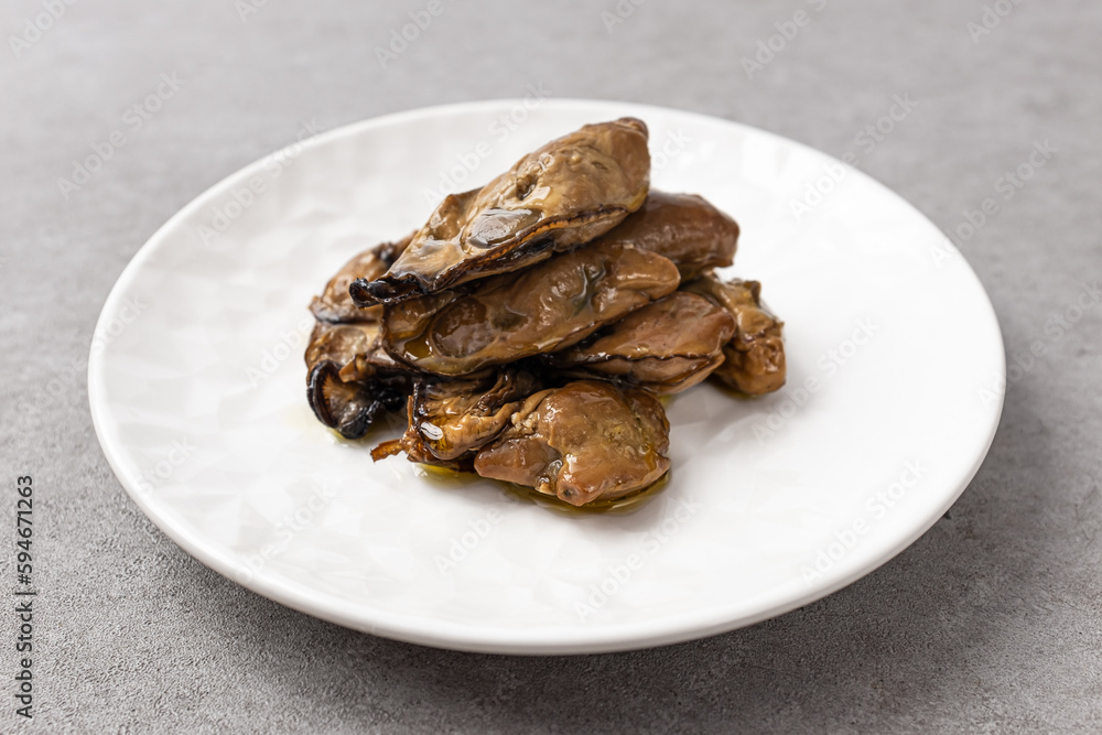 Smoked oysters smoked and marinated in olive oil Smoked oysters smoked and marinated in olive oil