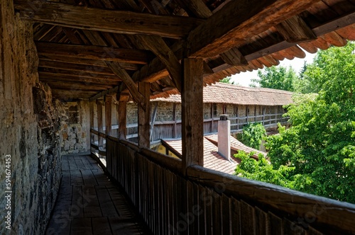 Of Rothenburg ob der Tauber town through old wooden window frames