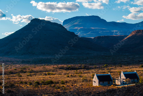 Chalets in the valley. Guest chalets beneath the Nuweveld escarpment in the Karoo National Park.