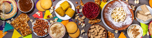 Traditional Festa Junina Summer Festival Carnival Food. Traditional Brazilian Festa Junina dishes and snacks - popcorn  peanuts  corn cake and cookie  pacoca  with holiday decorations and accessories