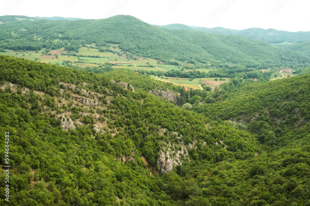 Amazing mountain landscape - covered with green forest slopes of the Larazev canyon in Eastern Serbia