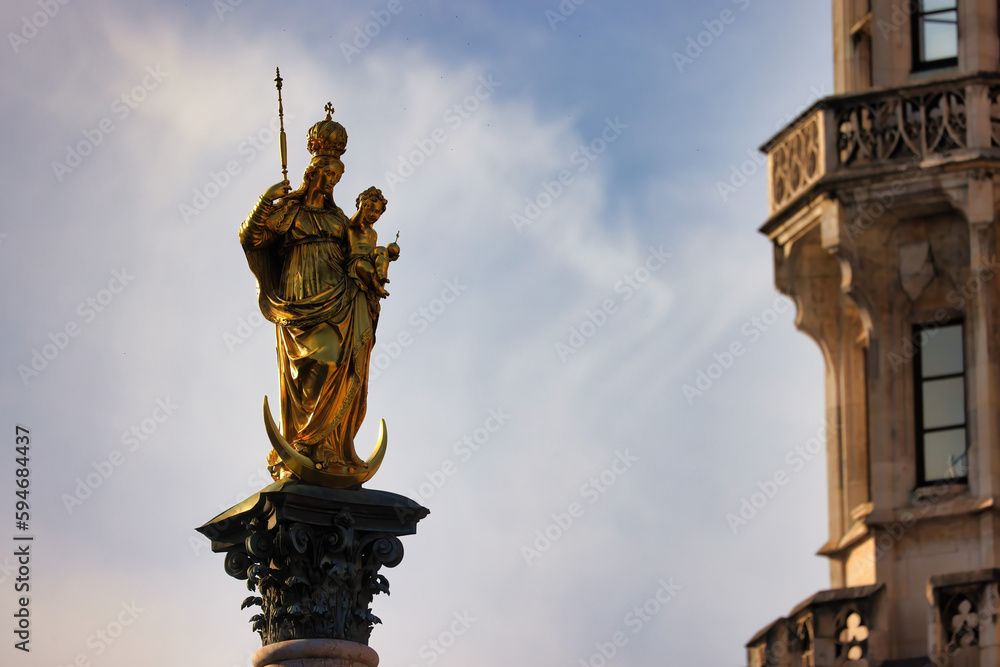 The Golden statue of Mary, a Marian column on the Marienplatz in Munich, German