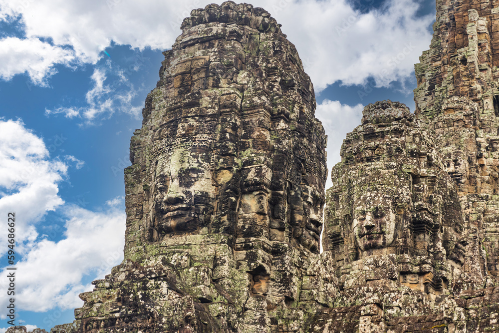 Ancient stone faces of Bayon temple, Angkor War, Cambodia
