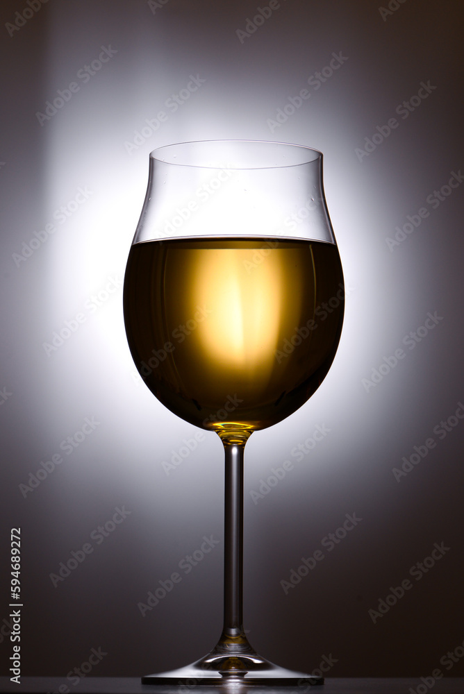 Glass of white wine on white background Glass of white wine on white background