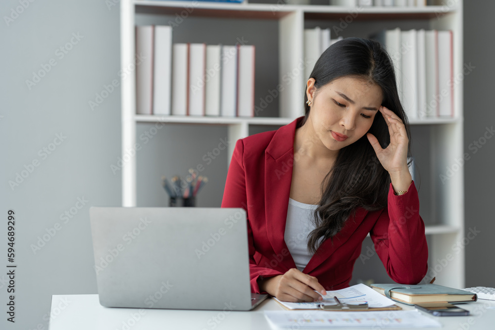 tired business woman sleepy and bored from sitting at a desk for a long time and has office syndrome tired business woman sleepy and bored from sitting at a desk for a long time and has office syndrome