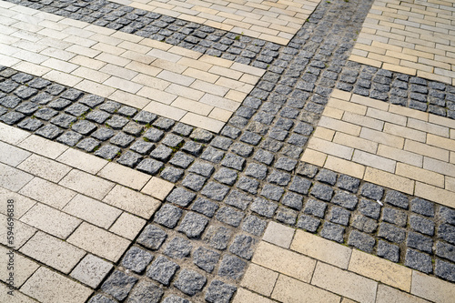 colored stone pavers, street tiles with patterns and ornaments, pedestrian path
