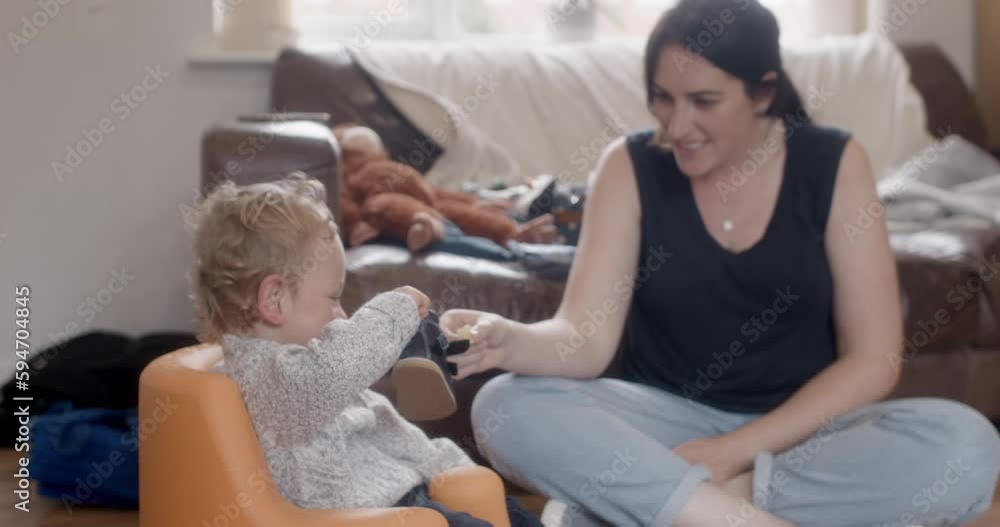 MS Mother feeding disabled son (18-23 months) at home MS Mother feeding disabled son (18-23 months) at home