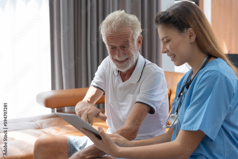 Elderly man talk to doctors and nurses in the hospital. senior male happy after receiving treatment and care and practice walk from a professional doctor. health care, physical therapy, nursing home Elderly man talk to doctors and nurses in the hospital. senior male happy after receiving treatment and care and practice walk from a professional doctor. health care, physical therapy, nursing home