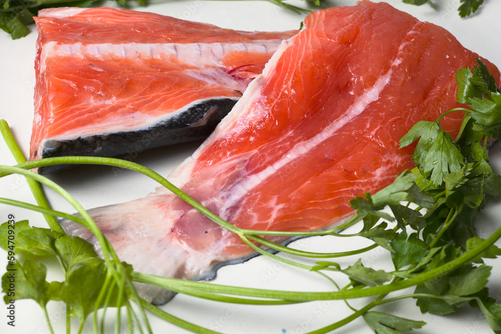 Platter with two pieces of salmon. Salmon is a good source of protein, omega-3 fatty acids, vitamins, and minerals. Platter with two pieces of salmon. Salmon is a good source of protein, omega-3 fatty acids, vitamins, and minerals.