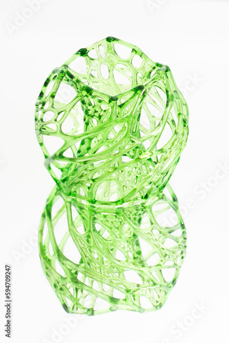 Artistic vase printed on 3D printers using SLA technology. Isolated on white background. Vertical photo