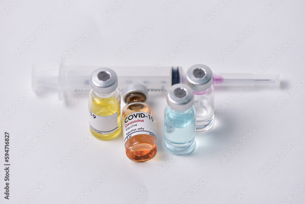 Vaccine bottle. Syringe on white background. Vaccination against quarantine coronavirus or covid-19, virus prevention and infection control. drug therapy concept Vaccine bottle. Syringe on white background. Vaccination against quarantine coronavirus or covid-19, virus prevention and infection control. drug therapy concept
