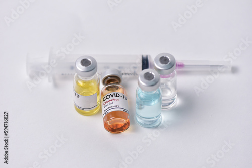 Vaccine bottle. Syringe on white background. Vaccination against quarantine coronavirus or covid-19, virus prevention and infection control. drug therapy concept
