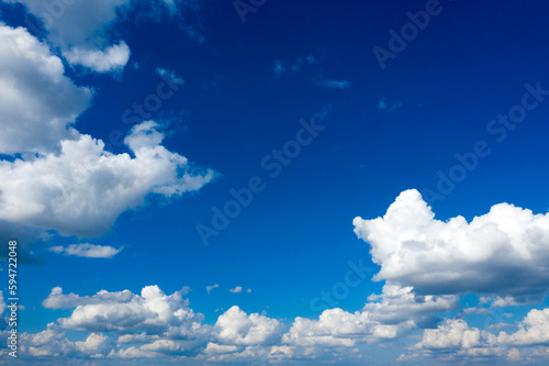 Photography white fluffy clouds with rainbow in the blue sky