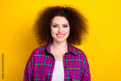Photo of cheerful sweet lady wear checkered jacket smiling isolated yellow color background