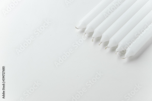 above view white candles on white background fire lamp funeral flame