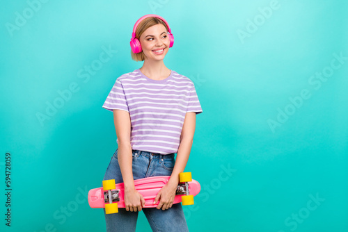 Photo advert banner of hipster girl enjoy her wireless apple airpods pro hold longboard look mockup sale isolated on cyan color background