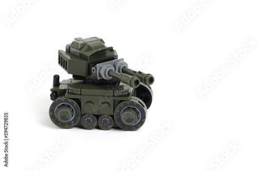 Toy tank green, military color, constructor white background,isolate.