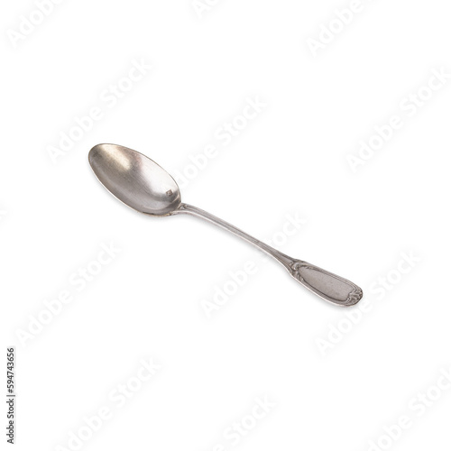 Old decorated metal tea spoon isolated over white background