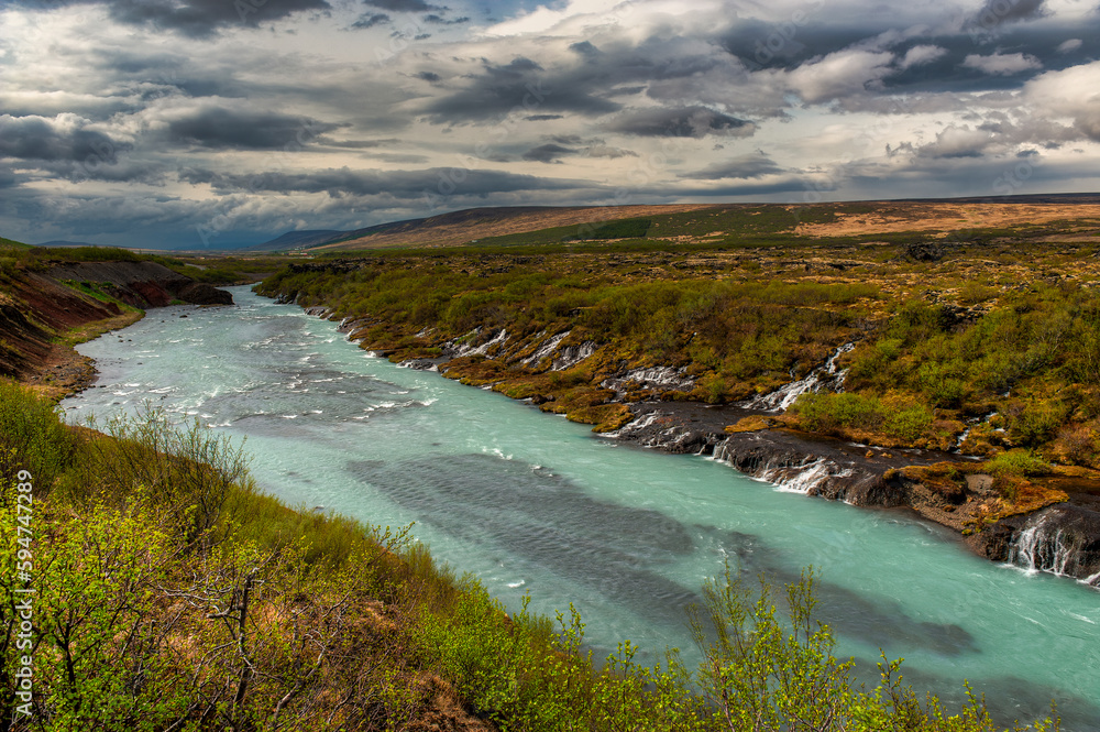 Hraunfossar is a waterfall located in western Iceland, on the Hvitá river, Hraunfossar is a waterfall located in western Iceland, on the Hvitá river,