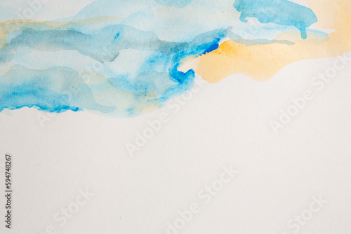 Front view of orange and blue stains on white isolated background