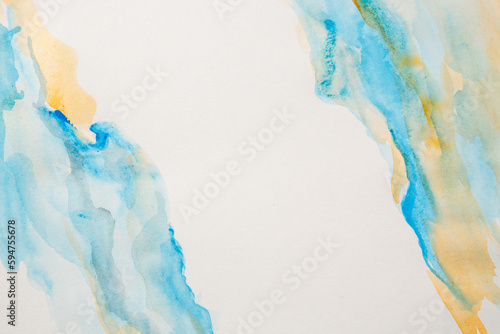 Top view of orange and blue stains on white isolated background