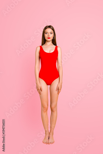 Water clothes outfit student lifestyle people one alone single person concept. Full size view photo shoot portrait of beautiful attractive pretty lovely standing lady isolated shiny vivid background © deagreez