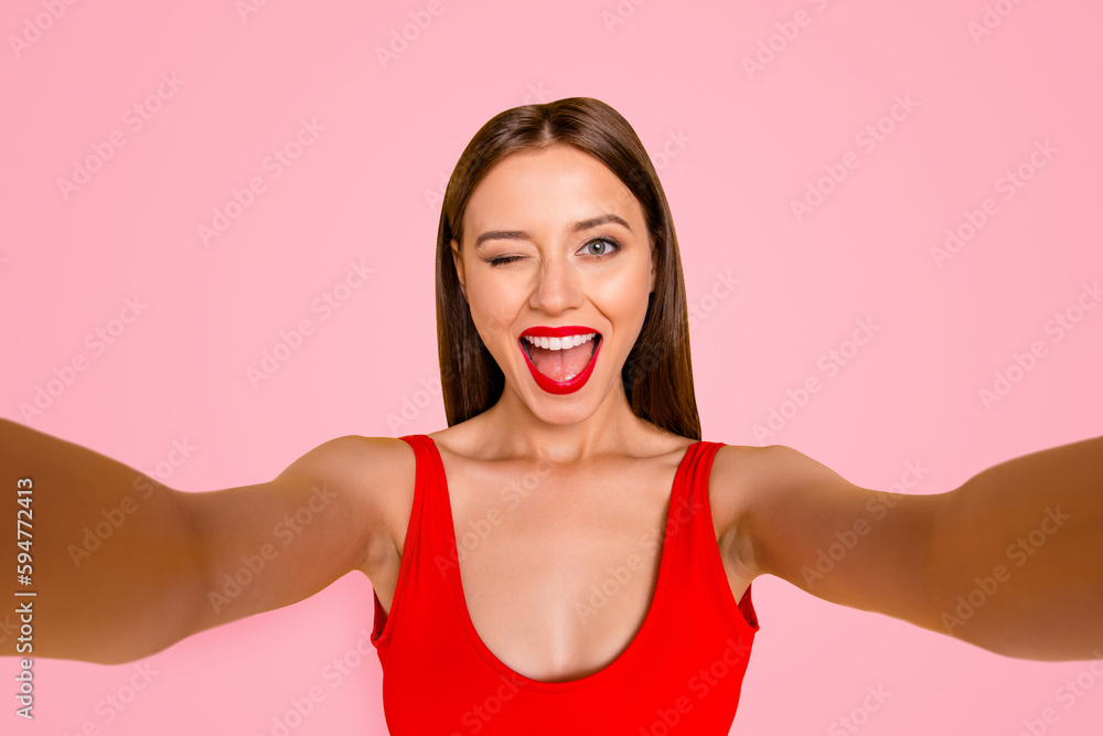 Hey there Closeup portrait of beautiful pretty charming rejoicing joking cute beautiful stunning funky funny comedian comic lady taking making selfie isolated bright background Hey there Closeup portrait of beautiful pretty charming rejoicing joking cute beautiful stunning funky funny comedian comic lady taking making selfie isolated bright background