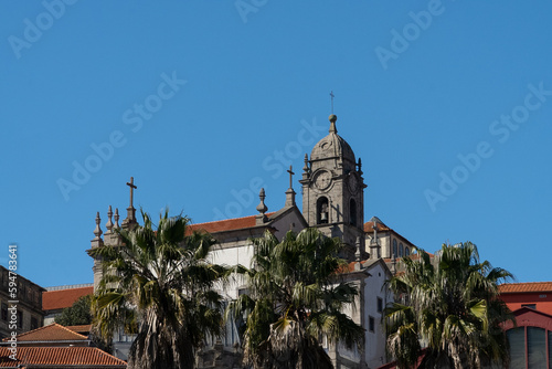 Oporto, Portugal. April 12 , 2022: Porto Cathedral with blue sky.