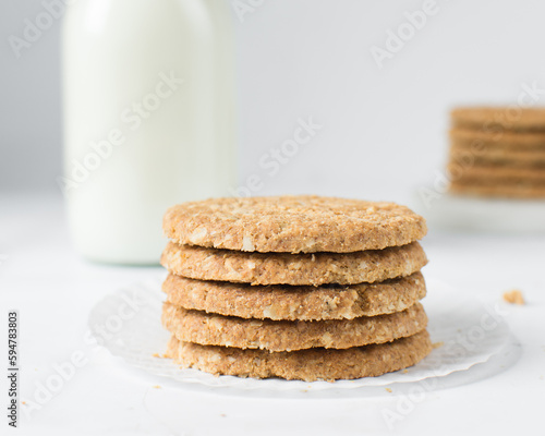 Stack of oat cookies, homemade oatmeal cookies, stack of thin oat biscuits