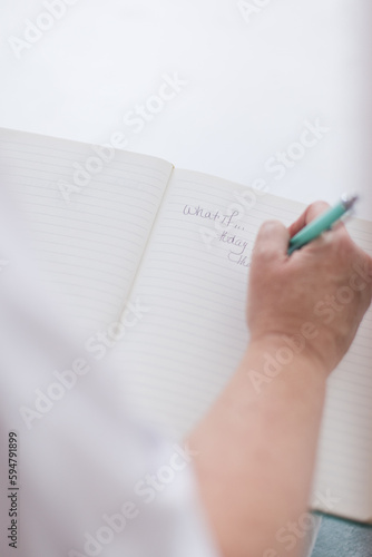 Writing a jurnal  photo