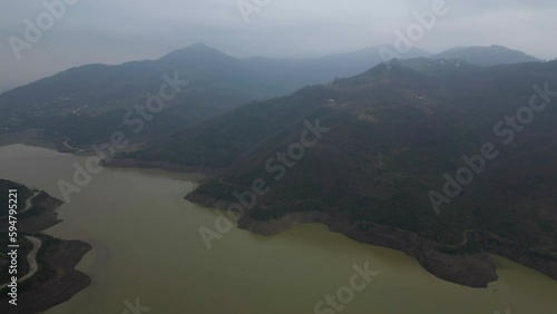 View over a dam and mountains from above