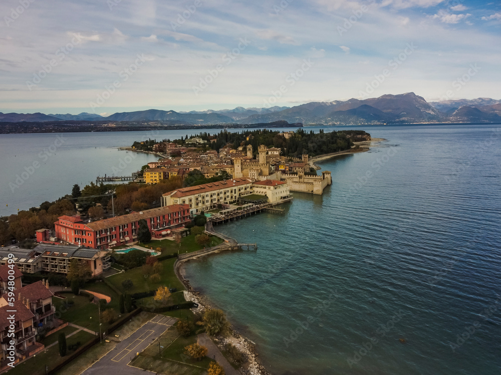 Aerial vIew by drone. Summer. Sirmione, Italia. Lago di Garda. Lake. Castle.
