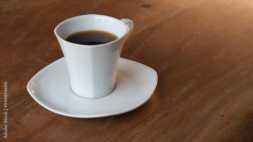 Obraz premium hand holding filter coffee in white porcelain mug