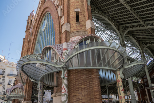 Detail of mosaic decorated facade of historic Columbus market (Mercado de Colon). VALENCIA, SPAIN. photo