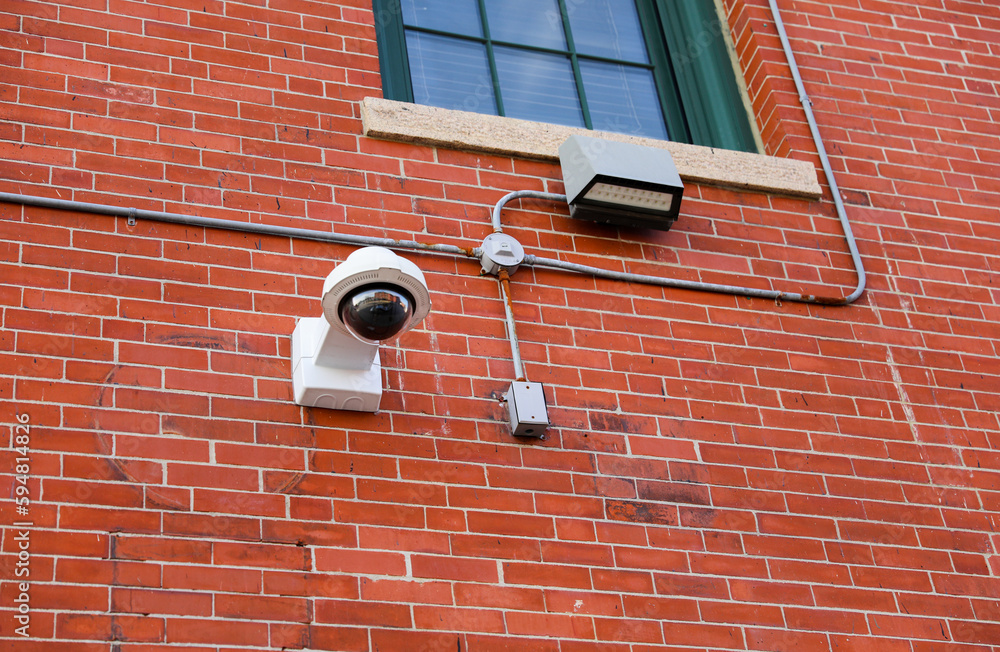 security camera in the image represents the use of technology for safety and protection. It symbolizes surveillance and monitoring as a means of preventing crime and detecting security breaches security camera in the image represents the use of technology for safety and protection. It symbolizes surveillance and monitoring as a means of preventing crime and detecting security breaches