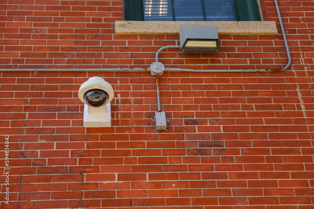 security camera in the image represents the use of technology for safety and protection. It symbolizes surveillance and monitoring as a means of preventing crime and detecting security breaches security camera in the image represents the use of technology for safety and protection. It symbolizes surveillance and monitoring as a means of preventing crime and detecting security breaches