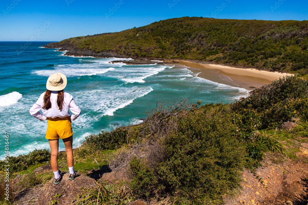 Girl in a hat looks at stunning hidden third beach (cove) in Hat Head ...
