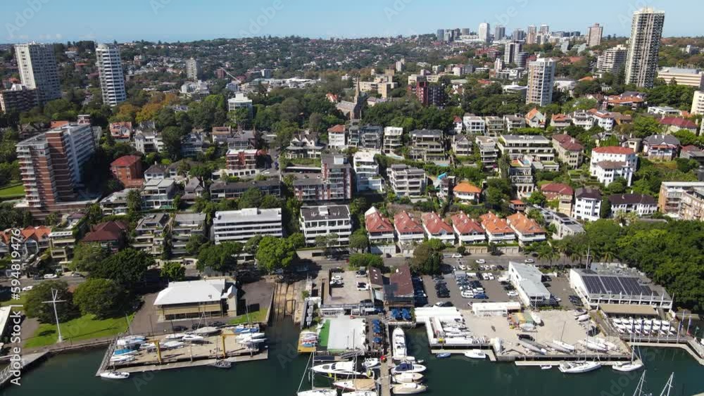 Aerial drone view of Darling Point along Rushcutters Bay foreshore in East Sydney, NSW Australia with Sydney Harbour in the background on a sunny day Aerial drone view of Darling Point along Rushcutters Bay foreshore in East Sydney, NSW Australia with Sydney Harbour in the background on a sunny day