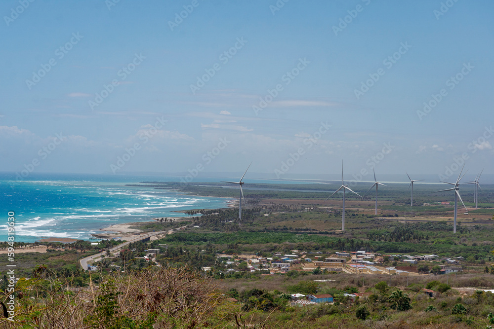 Field of wind generators on the seashore. Generation of green electricity.