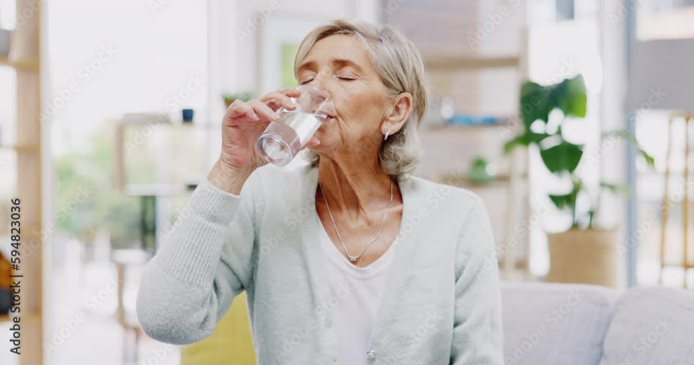 Wellness, home or healthy old woman drinking water for healthcare or natural vitamins in a house. Retirement, elderly relaxing or thirsty senior person refreshing with liquid for energy or hydration Wellness, home or healthy old woman drinking water for healthcare or natural vitamins in a house. Retirement, elderly relaxing or thirsty senior person refreshing with liquid for energy or hydration