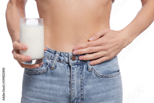 Woman with glass of milk suffering from lactose intolerance on white background, closeup