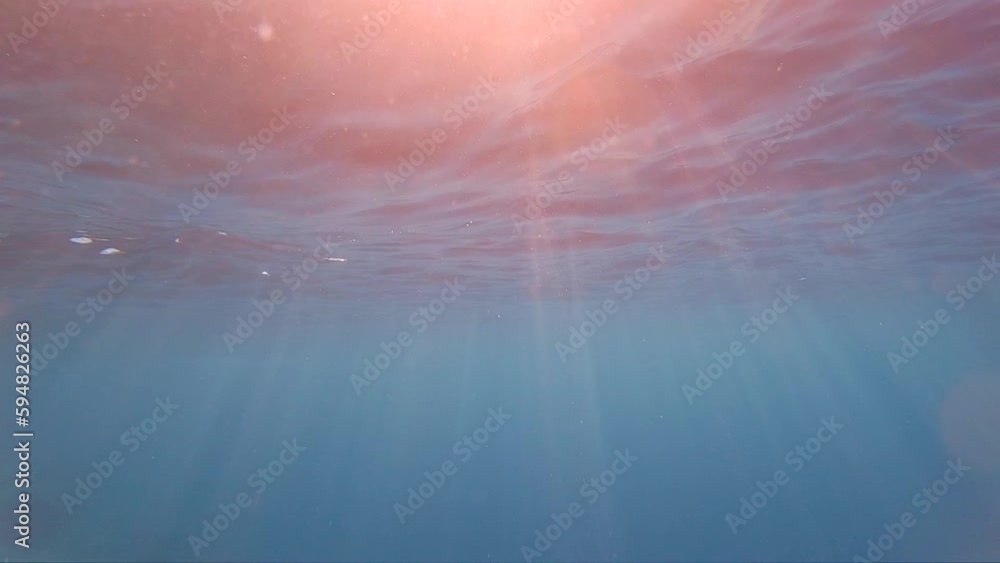 Underwater in the Mediterranean with light rays and particles Underwater in the Mediterranean with light rays and particles