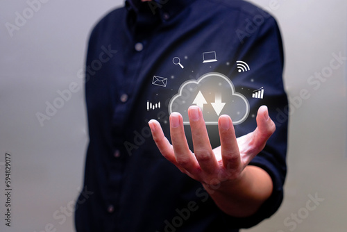 Hand of man holding digital share information data by upload and download pass thru cloud system. Technology, online and innovation concept.