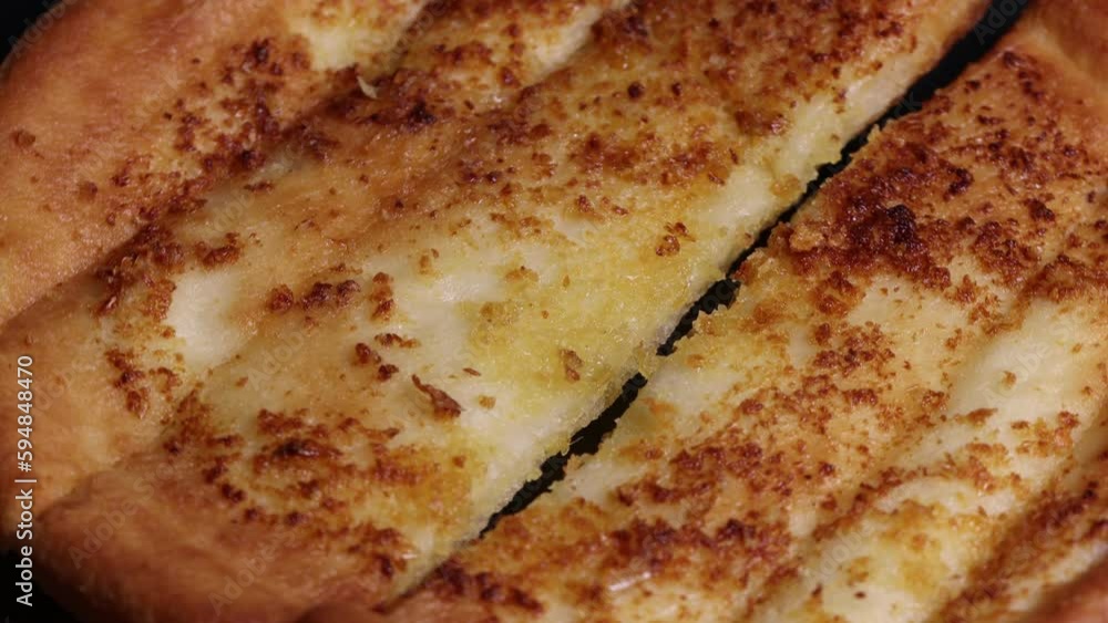Delicious garlic pizza slices with tasty cheese falling from Delicious garlic pizza slices with tasty cheese falling from