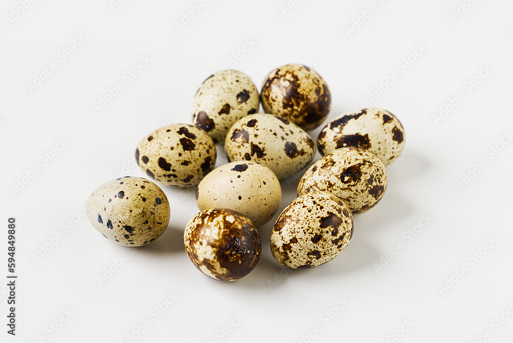 Quail eggs are isolated on a white background. small eggs. eco healthy food concept Quail eggs are isolated on a white background. small eggs. eco healthy food concept