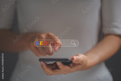 Mobile users are using search engines. SEO Search Engine Optimization, Website improvement concept to make search results higher and get websites ranked in top search rankings.