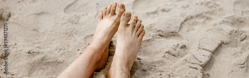 Beautiful women's sexy legs on sandy beach during vacation © Kostiantyn