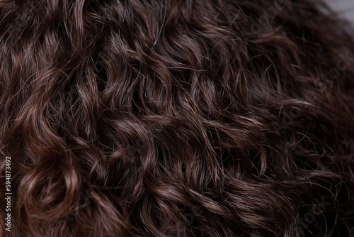 Frizzy textured dark brown hair. Generative AI.