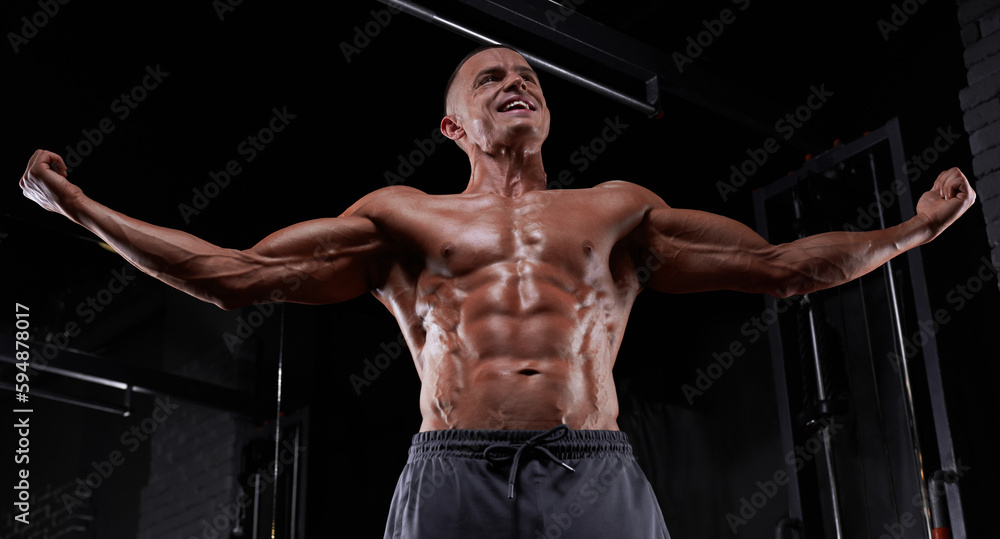 Handsome strong athletic man pumping up muscles, training, bodybuilding concept, muscular bodybuilder, handsome men doing exercises in the gym, naked. Handsome strong athletic man pumping up muscles, training, bodybuilding concept, muscular bodybuilder, handsome men doing exercises in the gym, naked.