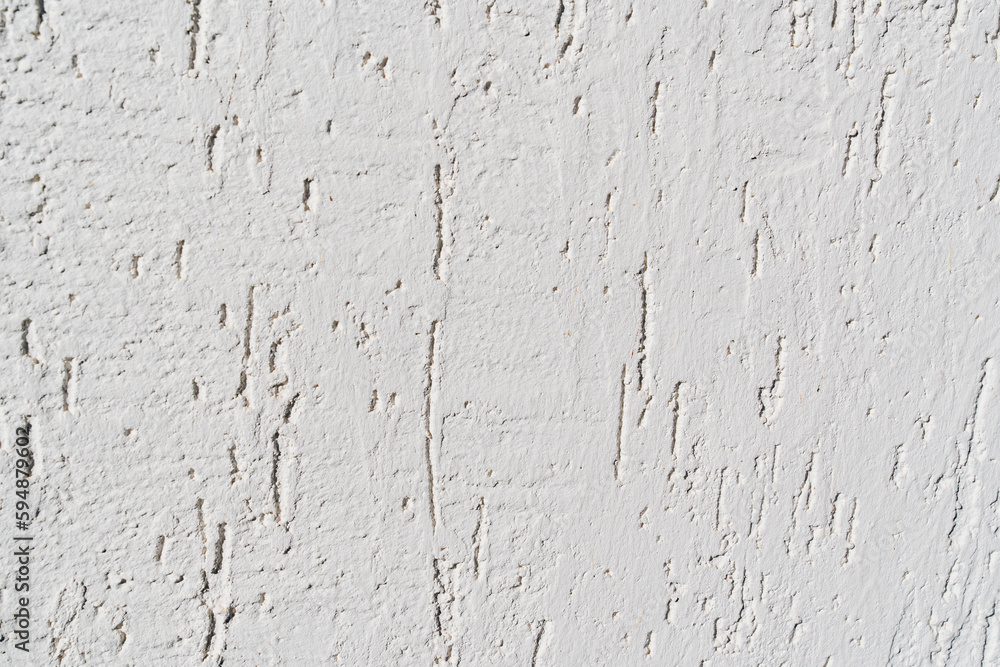 Obraz premium The surface of the wall with the texture of decorative plaster. 